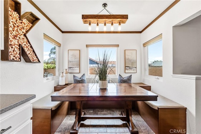 6222 Shawnee Rd, Westminster, CA 92683 - dining area featuring healthy amount of natural light, crown molding, and breakfast area
