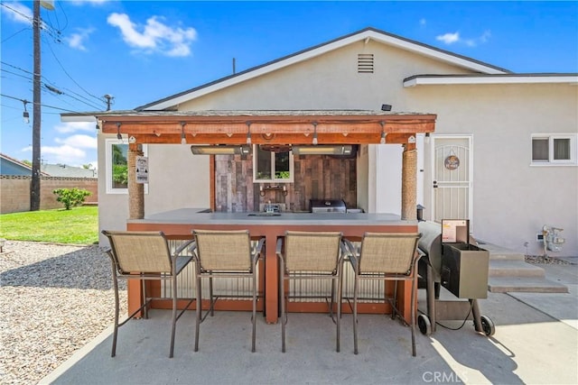 6222 Shawnee Rd, Westminster, CA 92683 - rear view of property featuring stucco siding, fence, and a patio