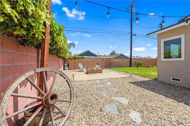 6222 Shawnee Rd, Westminster, CA 92683 - fenced backyard featuring a patio and an outdoor fire pit
