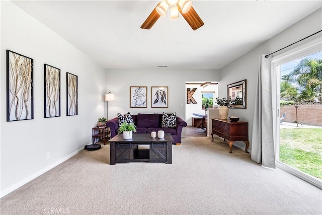 6222 Shawnee Rd, Westminster, CA 92683 - living room with carpet flooring, a ceiling fan, and baseboards