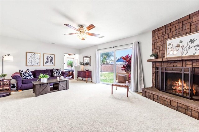 6222 Shawnee Rd, Westminster, CA 92683 - carpeted living room with ceiling fan and a fireplace