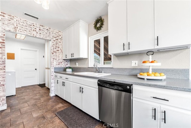 6222 Shawnee Rd, Westminster, CA 92683 - kitchen featuring stainless steel dishwasher, a sink, white cabinets, stone finish flooring, and light countertops