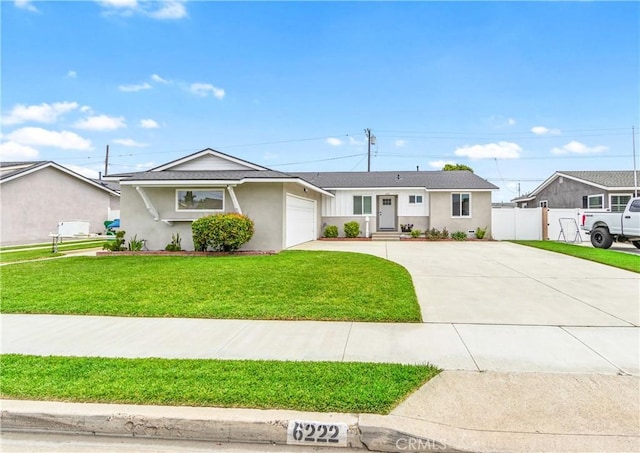 6222 Shawnee Rd, Westminster, CA 92683 - ranch-style house featuring driveway, an attached garage, stucco siding, and a shingled roof