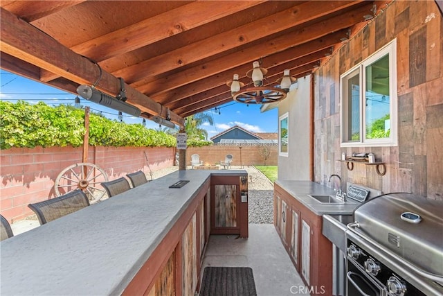 6222 Shawnee Rd, Westminster, CA 92683 - view of patio with area for grilling, a fenced backyard, and a sink