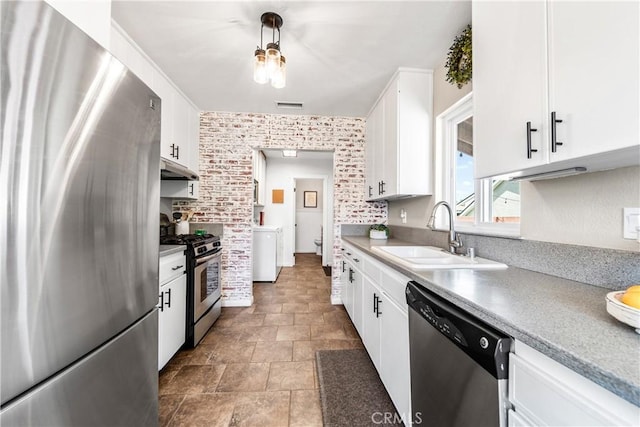 6222 Shawnee Rd, Westminster, CA 92683 - kitchen featuring stainless steel appliances, a sink, stone finish flooring, white cabinets, and under cabinet range hood