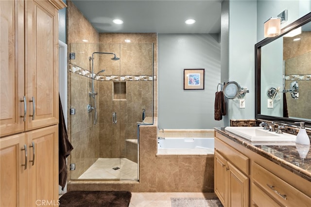27 Birdie Ln, Coto De Caza, CA 92679 - full bathroom with vanity, tile patterned flooring, recessed lighting, a bath, and a stall shower