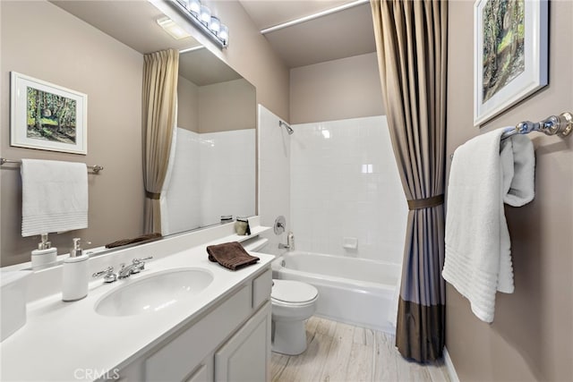 27 Birdie Ln, Coto De Caza, CA 92679 - full bathroom featuring toilet, shower / bathtub combination with curtain, wood finished floors, and vanity