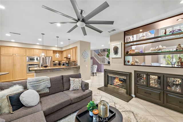 27 Birdie Ln, Coto De Caza, CA 92679 - living room featuring visible vents, a ceiling fan, light tile patterned floors, and a healthy amount of sunlight