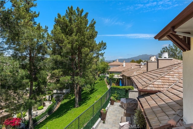 27 Birdie Ln, Coto De Caza, CA 92679 - view of yard featuring a mountain view, a fenced backyard, and a balcony