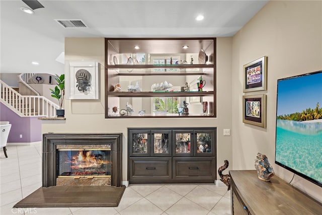 27 Birdie Ln, Coto De Caza, CA 92679 - bar with a multi sided fireplace, recessed lighting, visible vents, and light tile patterned floors