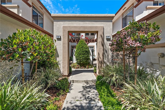 27 Birdie Ln, Coto De Caza, CA 92679 - doorway to property featuring stucco siding