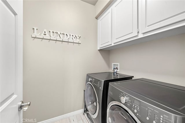 27 Birdie Ln, Coto De Caza, CA 92679 - laundry room featuring baseboards, cabinet space, and independent washer and dryer