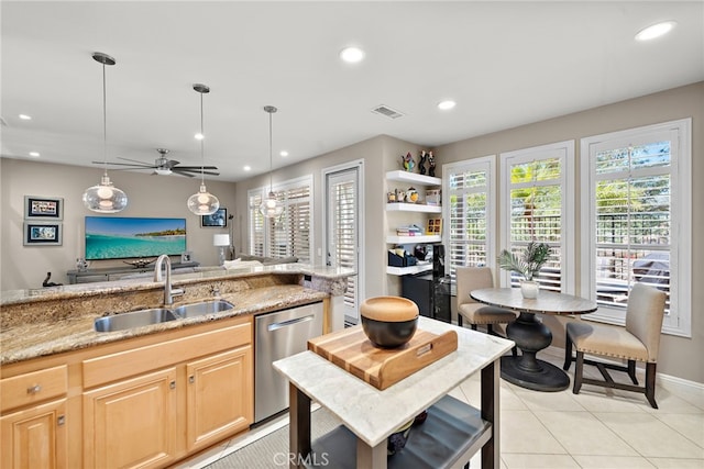 27 Birdie Ln, Coto De Caza, CA 92679 - kitchen featuring stainless steel dishwasher, a sink, light stone counters, light brown cabinets, and recessed lighting