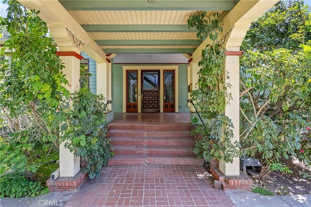 property entrance featuring covered porch