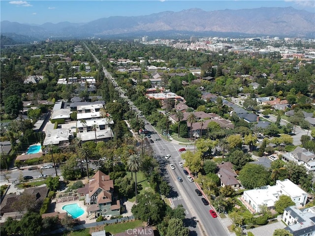 birds eye view of property featuring a mountain view