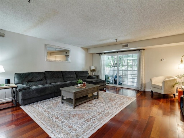 4142 E Mendez St Unit 331, Long Beach, CA 90815 - living area featuring a textured ceiling and wood finished floors