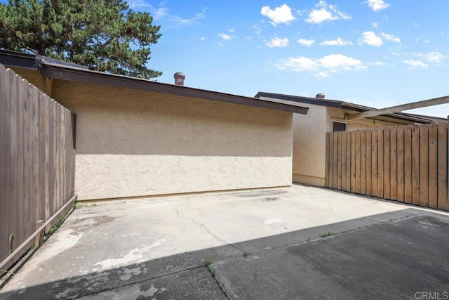 garage featuring fence