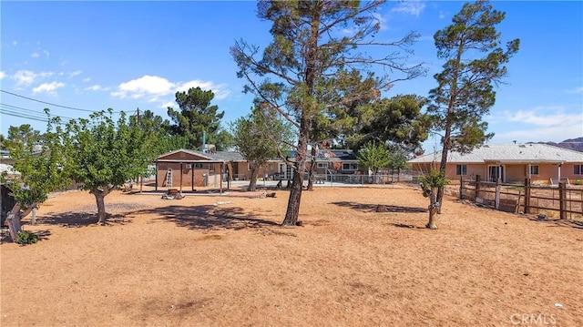 view of yard featuring fence