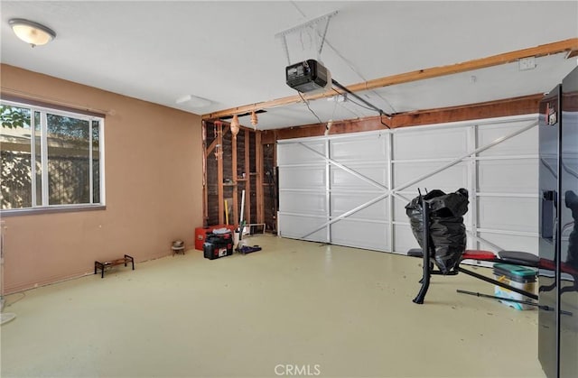garage featuring a garage door opener