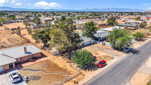 birds eye view of property featuring a residential view and a mountain view