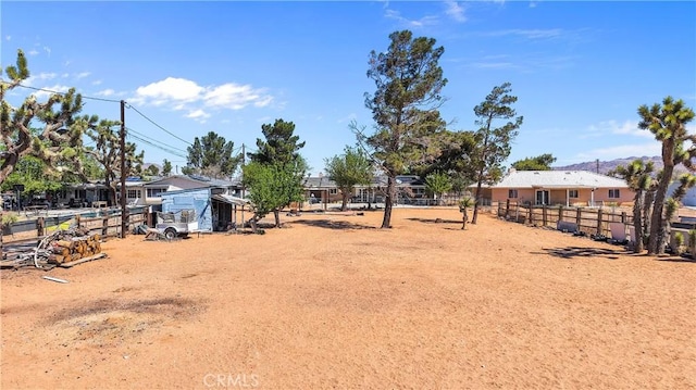 view of yard with fence