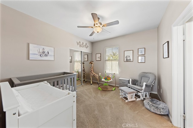 31768 Bottle Brush St, Winchester, CA 92596 - bedroom with carpet floors, baseboards, ceiling fan, and a closet