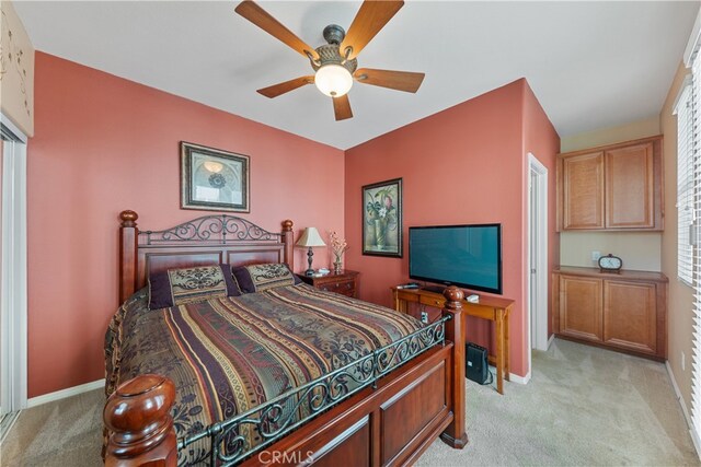 31768 Bottle Brush St, Winchester, CA 92596 - bedroom featuring baseboards, a ceiling fan, and light carpet