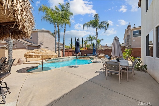 31768 Bottle Brush St, Winchester, CA 92596 - view of pool with an in ground hot tub, outdoor dining area, a patio area, a fenced in pool, and a fenced backyard