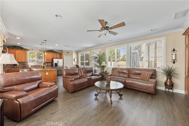 31768 Bottle Brush St, Winchester, CA 92596 - living area featuring a ceiling fan, visible vents, crown molding, wood finished floors, and recessed lighting