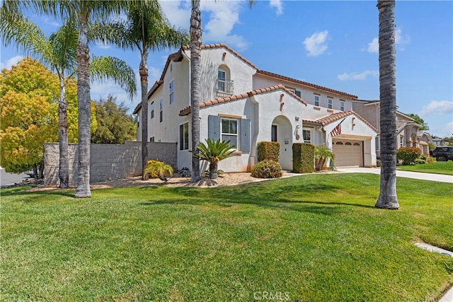 31768 Bottle Brush St, Winchester, CA 92596 - mediterranean / spanish-style home featuring a tiled roof, driveway, a garage, a front lawn, and stucco siding