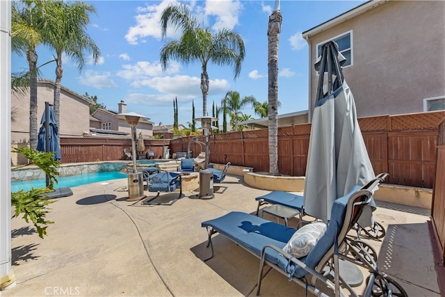 31768 Bottle Brush St, Winchester, CA 92596 - view of patio with a fenced in pool and a fenced backyard