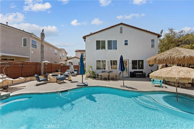 31768 Bottle Brush St, Winchester, CA 92596 - view of pool featuring a fenced in pool, fence, a patio area, and outdoor lounge area