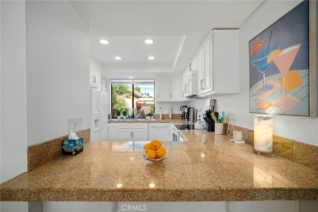 60 La Ronda Dr, Rancho Mirage, CA 92270 - kitchen featuring recessed lighting, white cabinets, white appliances, and a sink