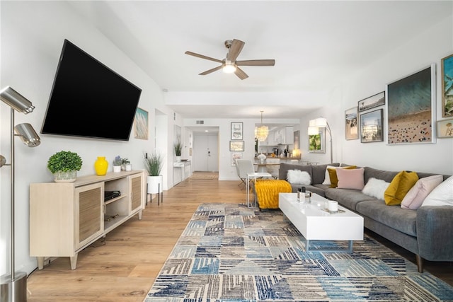 60 La Ronda Dr, Rancho Mirage, CA 92270 - living room with ceiling fan and light wood-style flooring