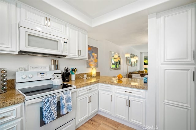 60 La Ronda Dr, Rancho Mirage, CA 92270 - kitchen featuring light wood-style floors, white cabinets, and white appliances