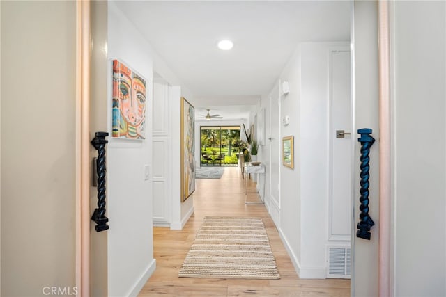 60 La Ronda Dr, Rancho Mirage, CA 92270 - hall featuring recessed lighting, baseboards, visible vents, and light wood-style floors