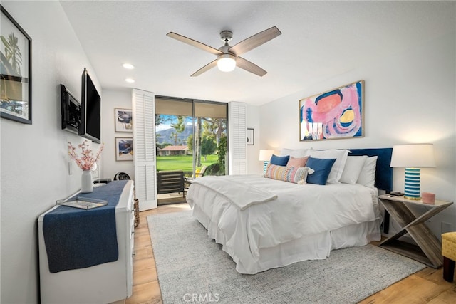 60 La Ronda Dr, Rancho Mirage, CA 92270 - bedroom featuring access to outside, recessed lighting, light wood-style flooring, and ceiling fan