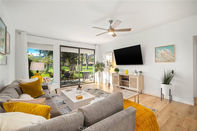 60 La Ronda Dr, Rancho Mirage, CA 92270 - living room featuring light wood-type flooring and a ceiling fan