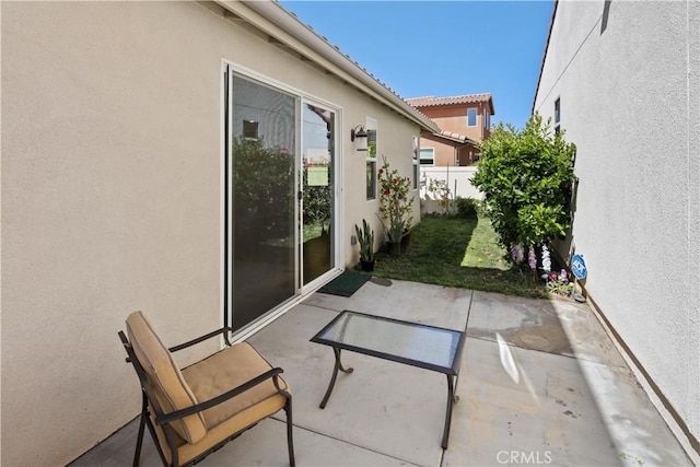 view of patio with fence