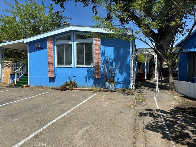 view of front of house featuring uncovered parking