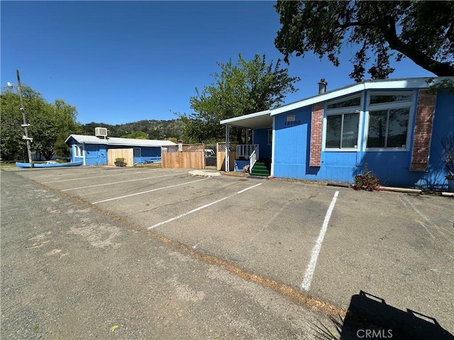 view of front of home with uncovered parking