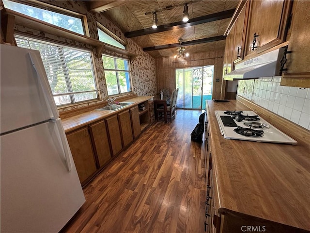 kitchen featuring dark wood-style flooring, white appliances, wood ceiling, under cabinet range hood, and butcher block counters