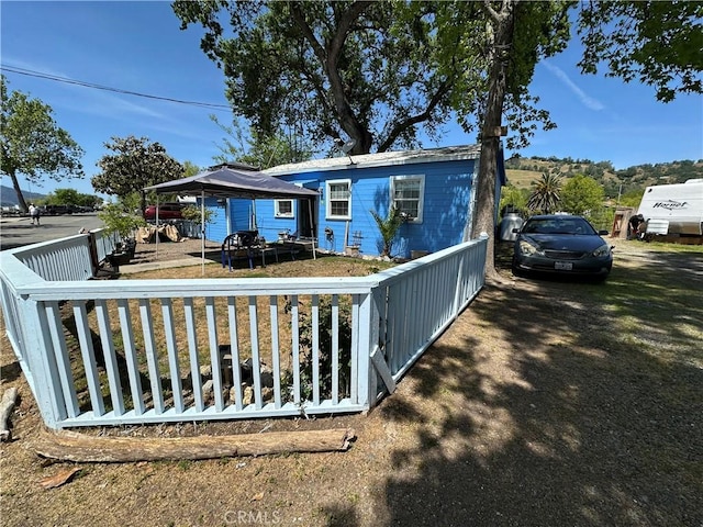 view of front of house with fence