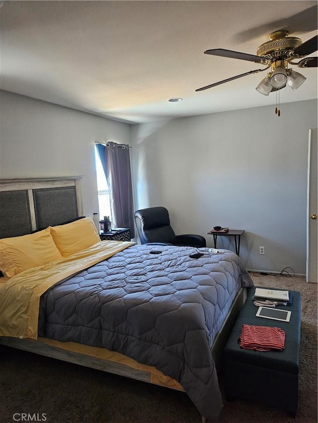 bedroom with carpet floors and ceiling fan