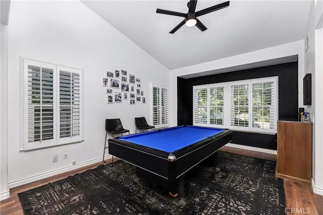 rec room with baseboards, ceiling fan, wood finished floors, and lofted ceiling