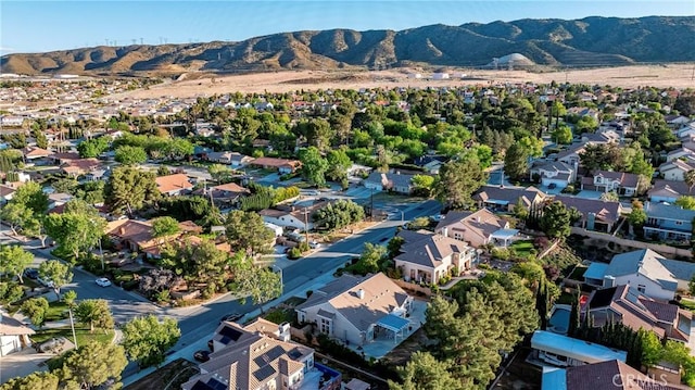 aerial view featuring a mountain view and a residential view