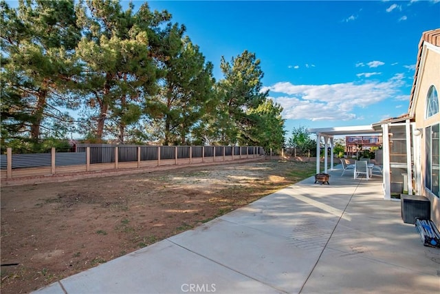 view of yard featuring a patio and a fenced backyard