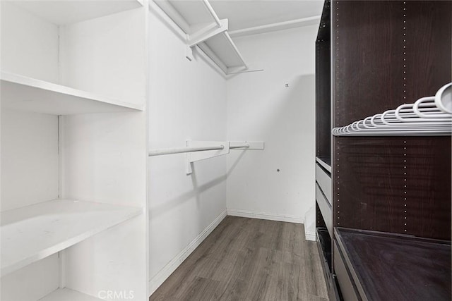 5461 Newcastle Ave Unit 14, Encino, CA 91316 - walk in closet featuring wood finished floors