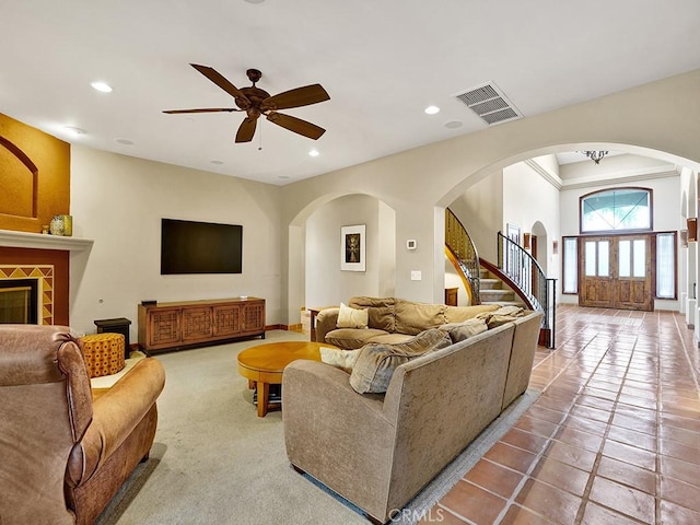 508 Lantern Crest Dr, Redlands, CA 92373 - tiled living room featuring arched walkways, visible vents, and recessed lighting