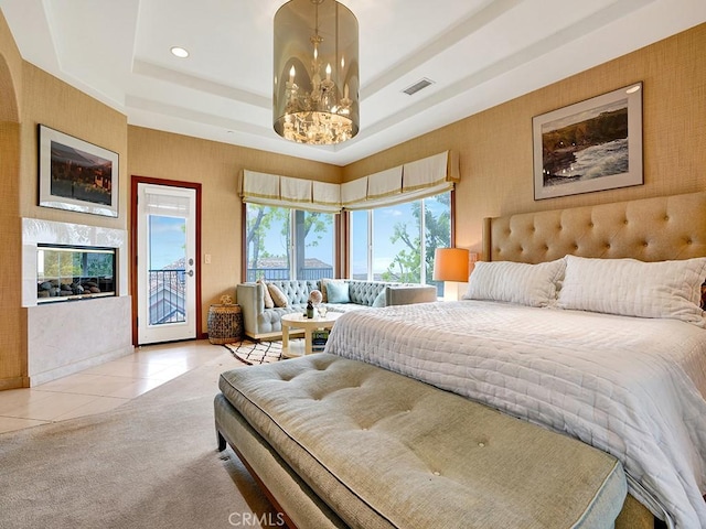 508 Lantern Crest Dr, Redlands, CA 92373 - bedroom featuring access to exterior, visible vents, light tile patterned floors, a tray ceiling, and wallpapered walls